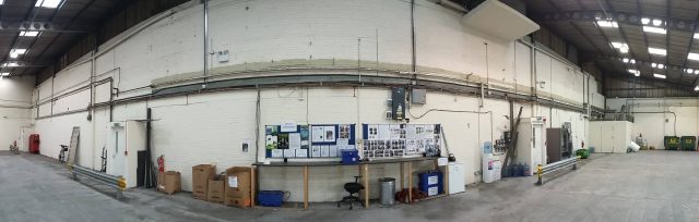 Electrical contractors install cables to factory